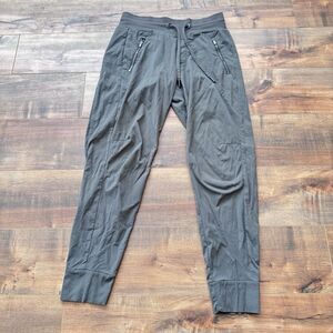 Athleta Trekkie North Jogger Pants Women’s Size 0 Olive Green Zip Pockets Hike